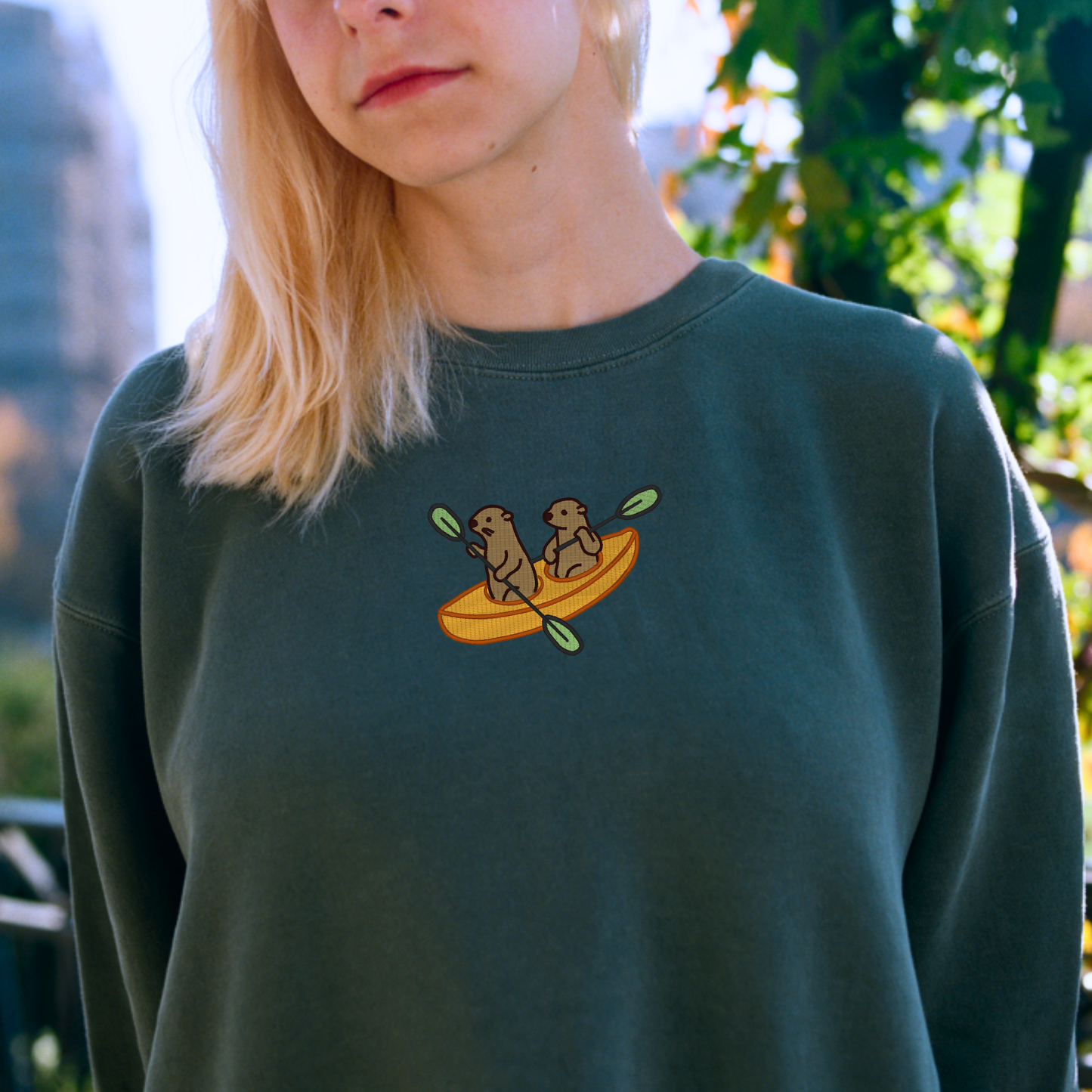 Embroidered Otters Kayaking Sweatshirt